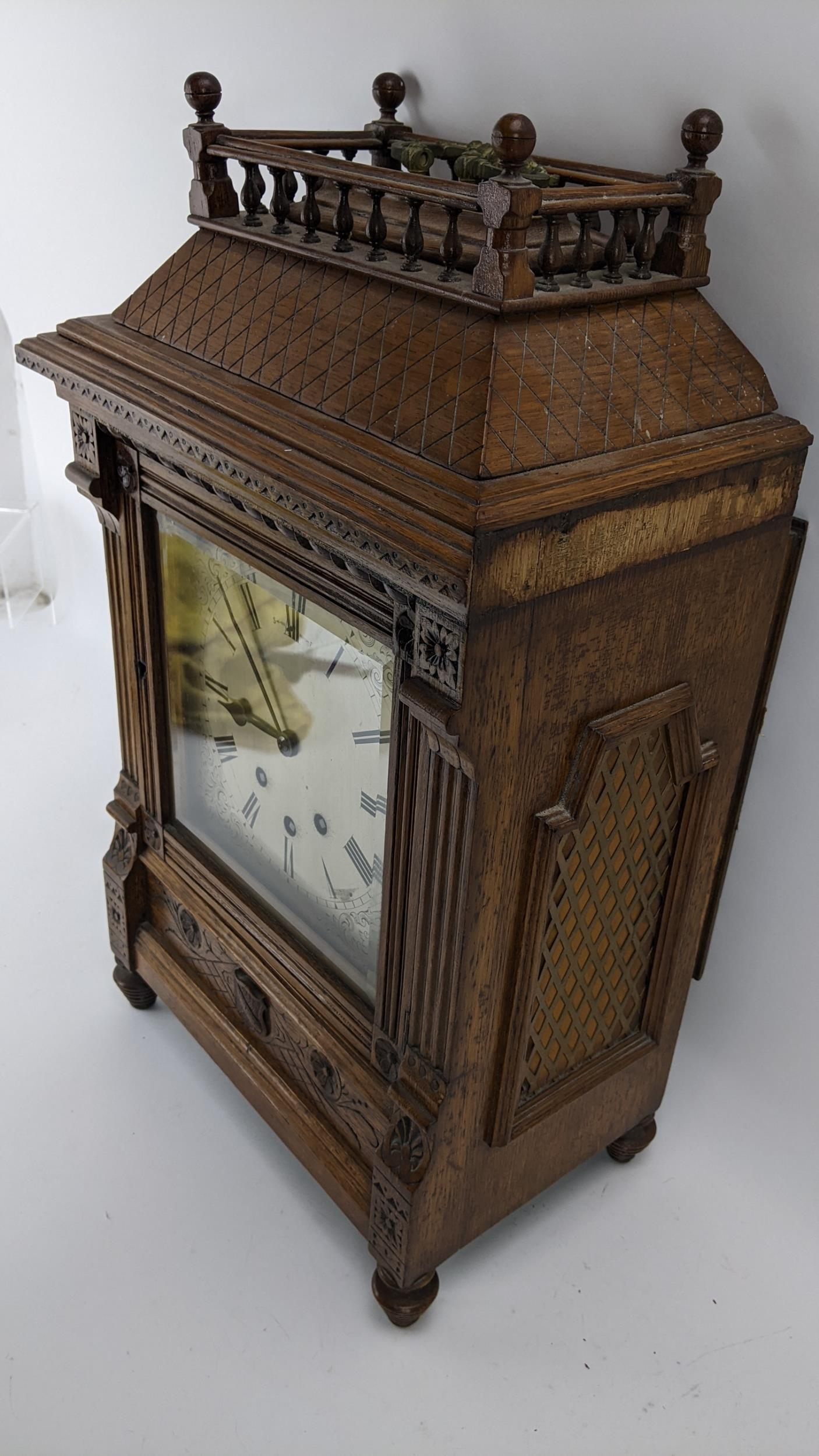 A late 19th century oak bracket clock, the case of architectural design having a handle to the top - Image 5 of 9