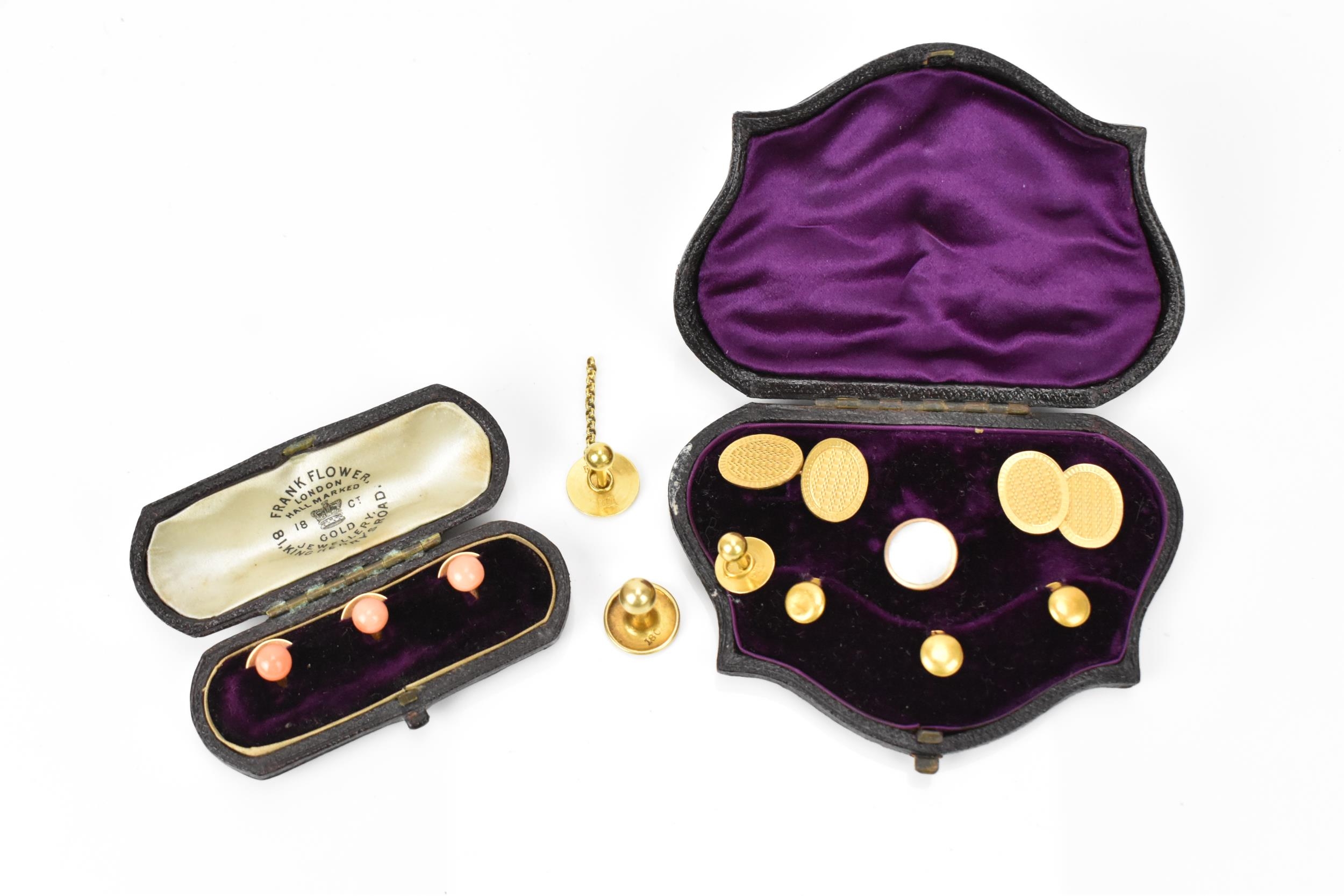 A pair of early 20th century 9ct yellow gold cuff links, together with a boxed set of 18ct dress