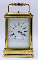 A late 19th Century repeating carriage clock, by Henri Jacot, Paris, having a white enamel roman