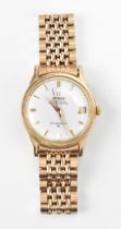 An Omega Constellation, automatic, gents, gold plated wristwatch, having a white dial, centre