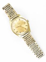 An Omega, automatic, gents, gold plated vintage wristwatch, having a gilt dial with baton markers,