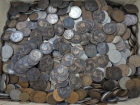 A quantity of British Victorian and later pennies, along with past 1947 half crowns, florins/two
