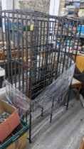 A wrought iron wine bottle cage/rack for one hundred and fifty bottles Location: