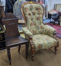 A Victorian walnut armchair, together with an oak hall chair Location: