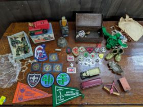 A mixed lot of 1960s cloth and metal boy scout badges, diecast Dinky Toy vehicles including a