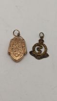 A 9ct rose gold plated floral embossed locket pendant, 3.2g and one other Location:
