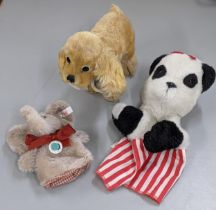 A Steiff Cockie Cocker Spaniel with working squeaker along with two hand puppets to include Steiff
