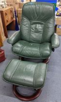 A Ekornes stressless green leather armchair with matching footstool Location: