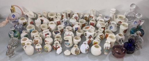 A collection of crested China ornaments together with mixed scent bottles Location: