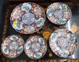 A quantity of Imari chargers and bowls Location: RAB