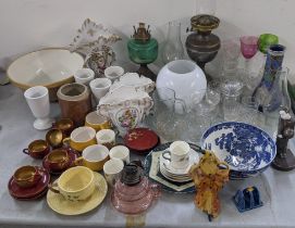 A mixed lot to include Victorian oil lamps, Tiffany Portuguese cup and saucer, hock glass and