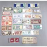 Mixed banknotes from around the world to include a 1973 Hong Kong and Shanghai Banking corporation