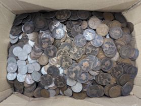 A quantity of British Victorian and later pennies, along with past 1947 half crowns, florins/two