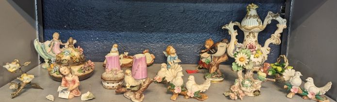 Capodimonte to include figures of angels A/F, model birds A/F, a teapot, lidded pots and others