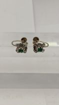 A pair of 9ct gold screw earrings, each set with an emerald, 3.6g Location: