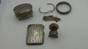 Silver and silver coloured metal to include two bracelets, a miniature vase, a cigarette case and