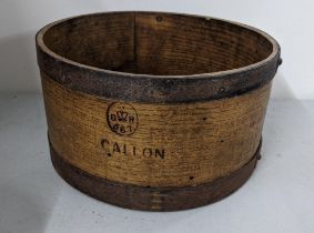 A Victorian oak and metal bound gallon grain measure Location: