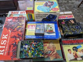 A selection of vintage board games to include Risk, Frustration, and Booby Trap, a Clock a Word,