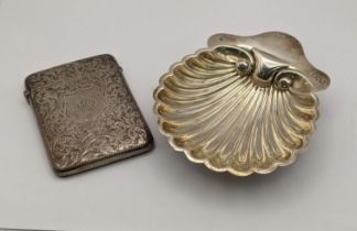 A silver butter dish hallmarked 1897 fashioned as a seashell along with a silver floral engraved