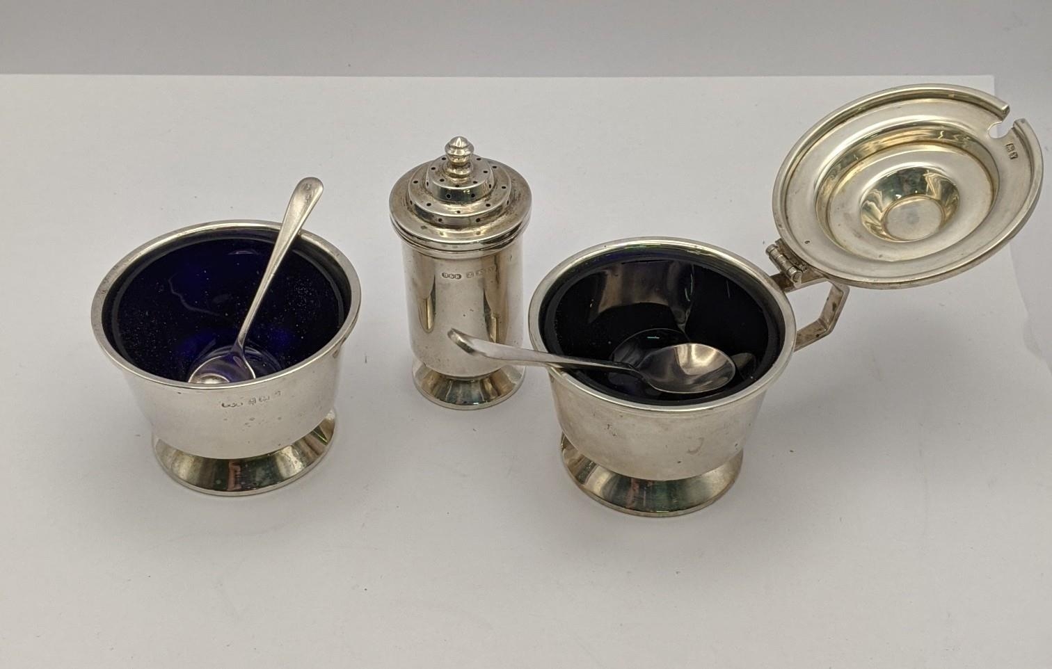 A silver condiment set hallmarked Birmingham 1948, 162g excluding glass Location: - Image 2 of 2