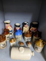 A group of four Royal Doulton, Shorter Bros and Burlington pottery character jugs to include a