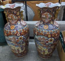 A pair of large Oriental porcelain floor vases with gilded seahorse handles, 90cm high, one A/F