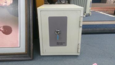 A Phoenix 500 Fire safe with a shelved interior lockable with key, 43cm h, 35.5cm w, 42cm d