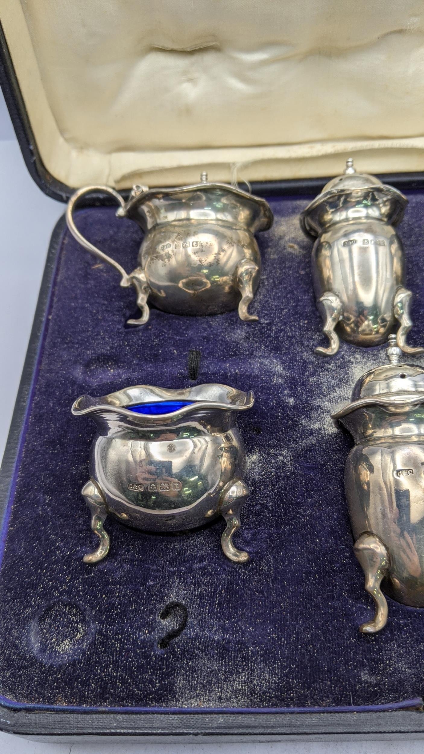 A six piece condiments hallmarked Birmingham 1918, total weight excluding glass 226g, box A/F - Image 2 of 3