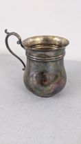 An Edwardian silver cup engraved with initials, hallmarked Sheffield 1902, 115.8g Location: