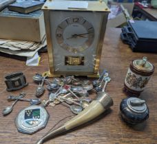 A mixed lot to include a Seiko Westminster Whittington Mantle clock, Souvenir spoons, Colibri Silver