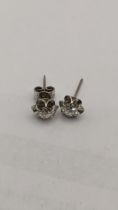 A pair of 18ct white gold diamond earrings 1.7g Location: