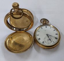 An early 20th century gold plated keyless wound open faced pocket watch, together with a gold plated