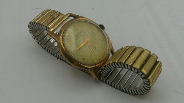 A Rotary 9ct gold cased gentleman's wristwatch faced an Arabic and baton dial Location: