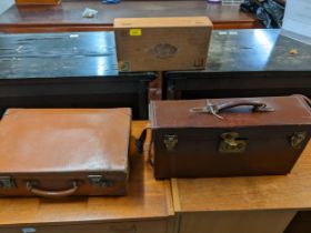 A Dunhill Jamaican wooden cigar box, and a leather travel case with key, and one other Location: