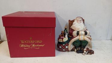 A Waterford china Christmas cookie jar fashioned as Father Christmas with a sack, boxed Location: