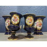 A pair of Meissen porcelain blue vases A/F having painted gilt and floral decoration, along with a