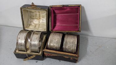 Two pairs of late 19th/early 20th century silver cased napkin rings, 109.4g Location: