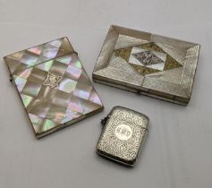 A silver floral vesta cast having engraved initials together with two mother of pearl card cases A/F