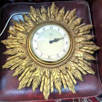 A vintage Smith wall hanging Star burst clock, converted to three pin plug A/F Location: