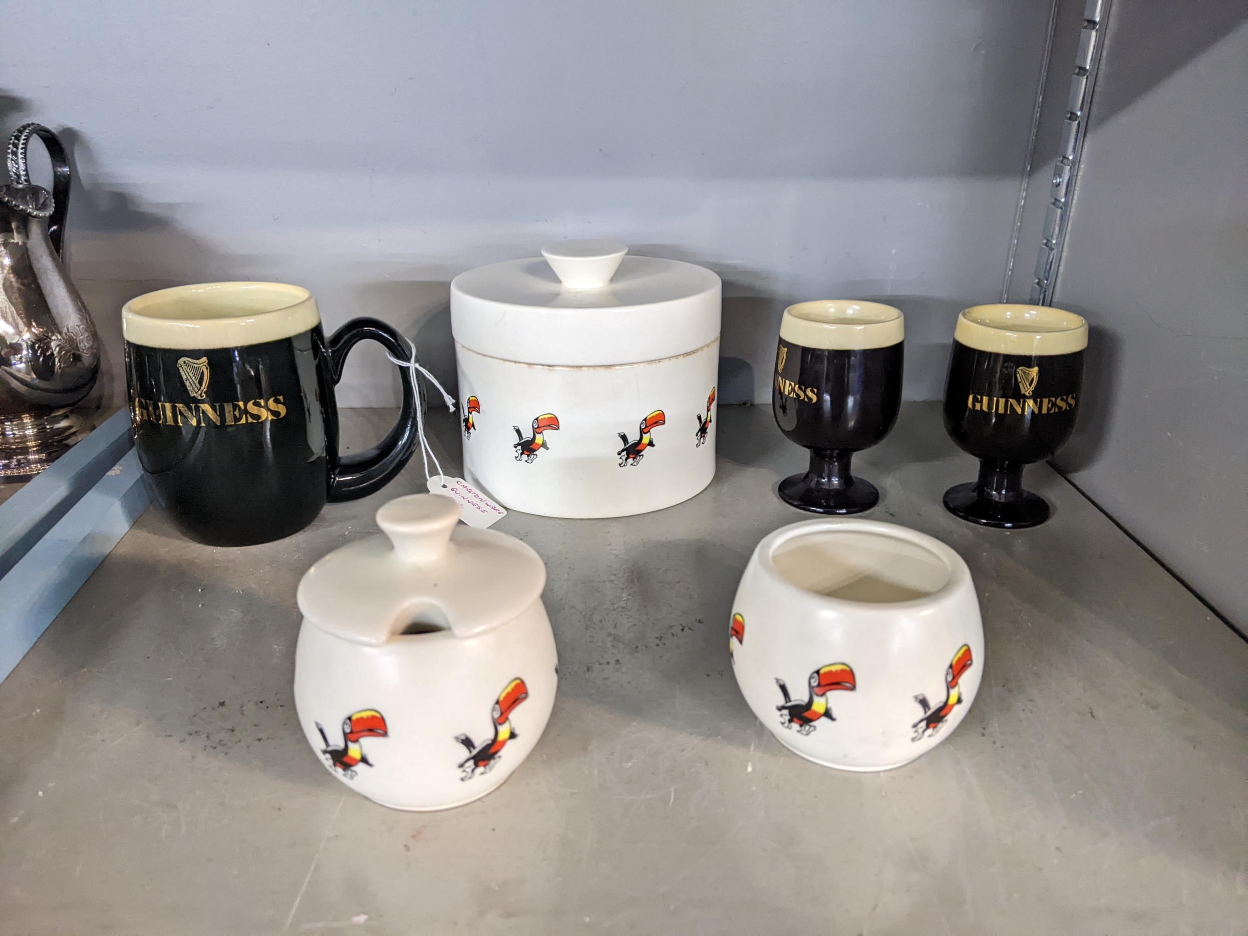 Carlton ware Guinness advertising ceramics comprising two eggcups, condiments, a mug and a lidded