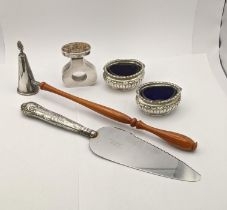 A pair of silver embossed condiments, a silver snuffer, together with a white metal Mexican scent