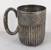 An early 20th century silver embossed cup having a reeded body 125.6g Location:
