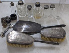A mixed lot of silver to include dressing table brushes, jars, and other items Location: