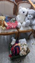 A collection of soft toys to include three Ty Beanie Babies in Perspex boxes, a Harrods 2004 bear, a