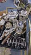 Silver plate to include tea sets, a toast rack, fish servers, preserve spoons, and other items