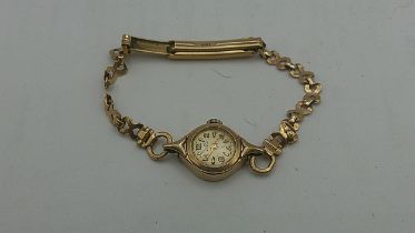 A Bentima Star gold cased ladies wristwatch on a 9ct gold strap faced with an Arabic dial (7.3g)