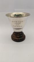 A white metal trophy cup on a wooden base stamped 800, total weight excluding base 96.2g Location: