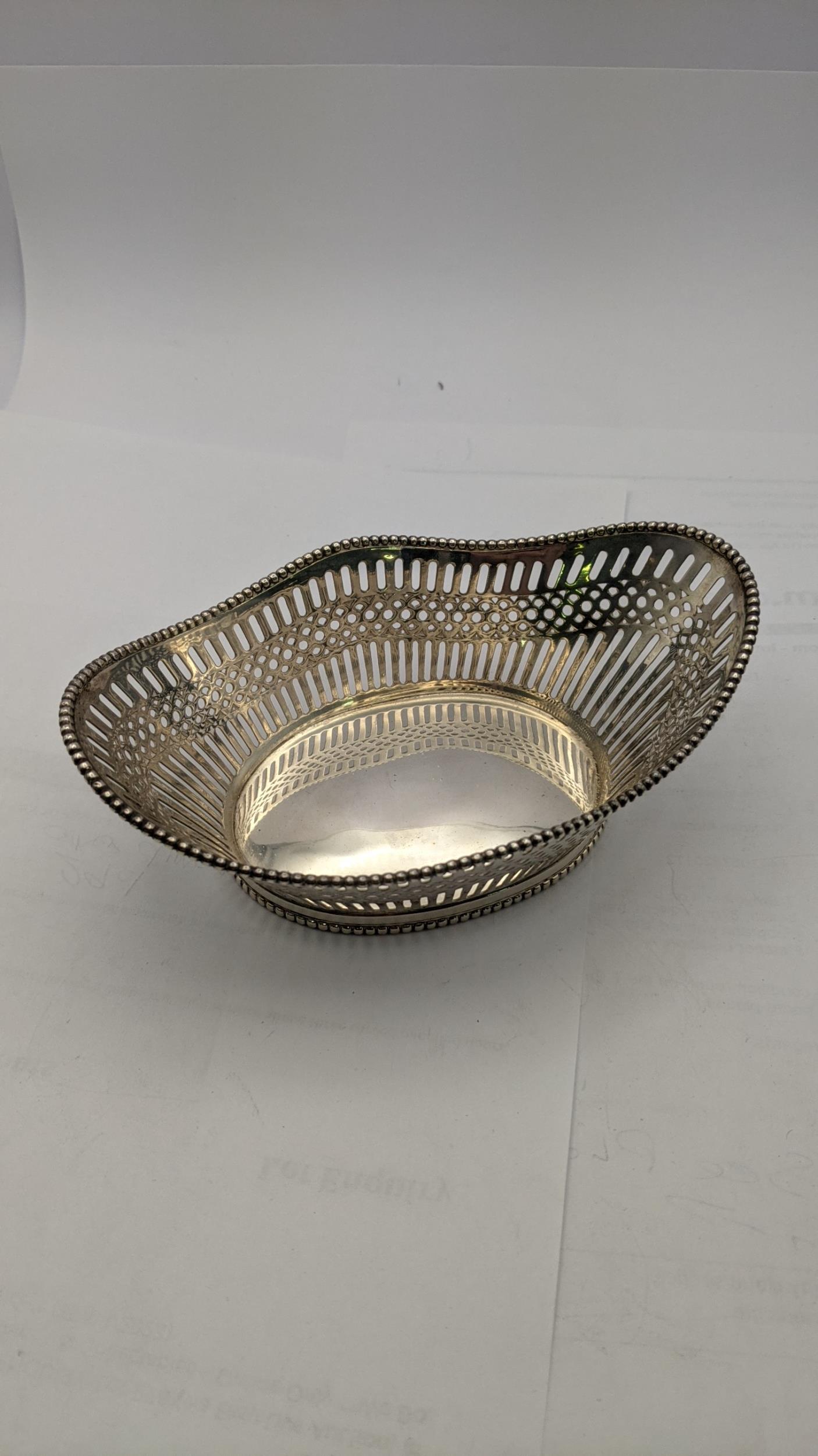 A White metal pierced oval shaped dish stamped 800, total weight 104.5g Location: