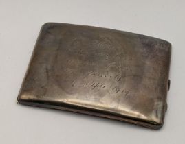 A silver cigarette case having an engraved message, hallmarked Birmingham 1918, total weight 164.