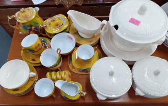 A Phoenix china yellow ground tea and breakfast service decorated with images of fruit together with